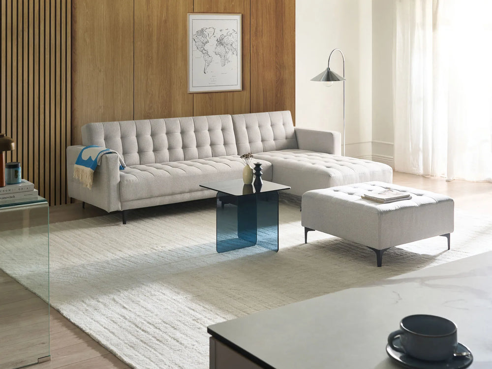 Light grey fabric modular corner sofa bed, left-hand layout with ottoman