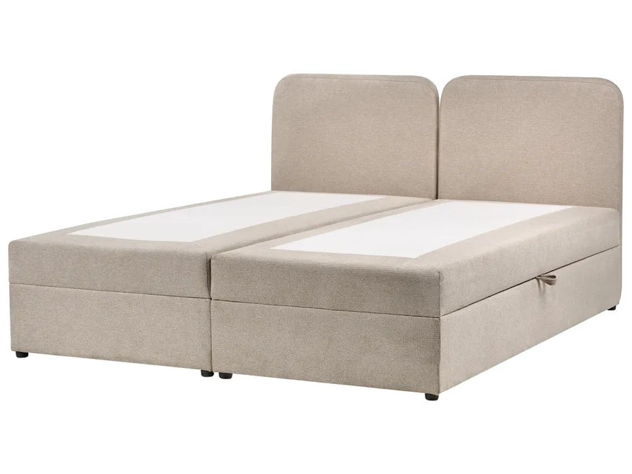 Beige upholstered bed with storage drawers on a white background