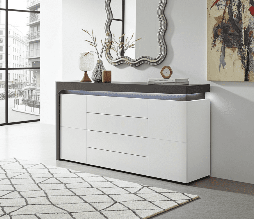 Modern interior with a white dresser, decorative mirror, and abstract painting.