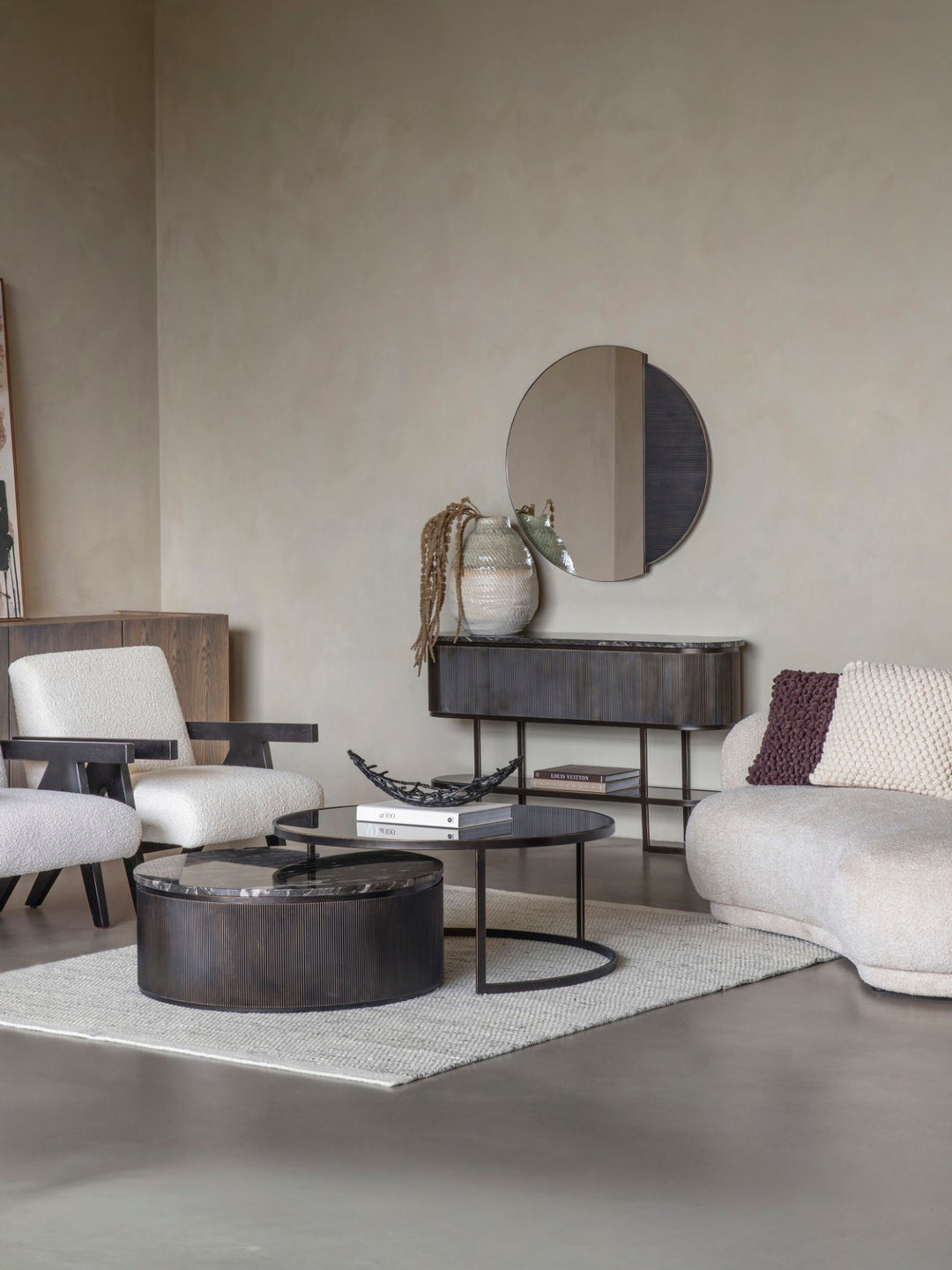 Modern living room with gray walls, furniture, and decor.