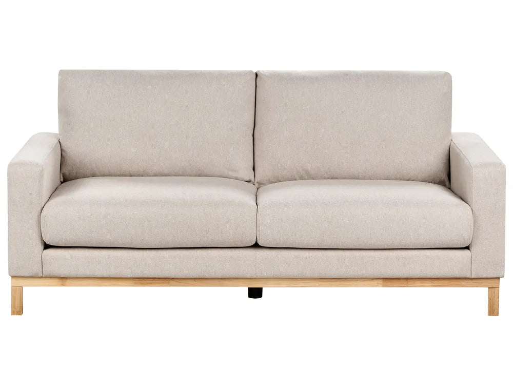 Beige sofa with wooden legs on a white background