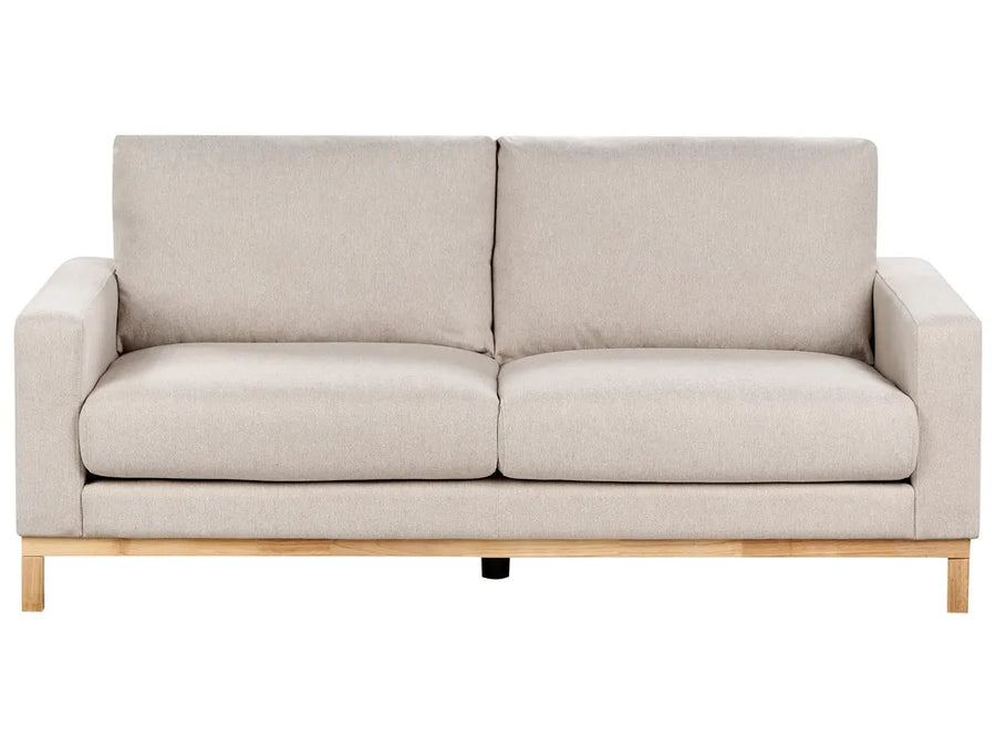 Beige sofa with wooden legs on a white background