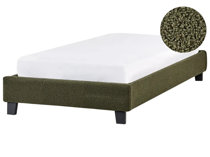 Modern dark green upholstered boucle bed