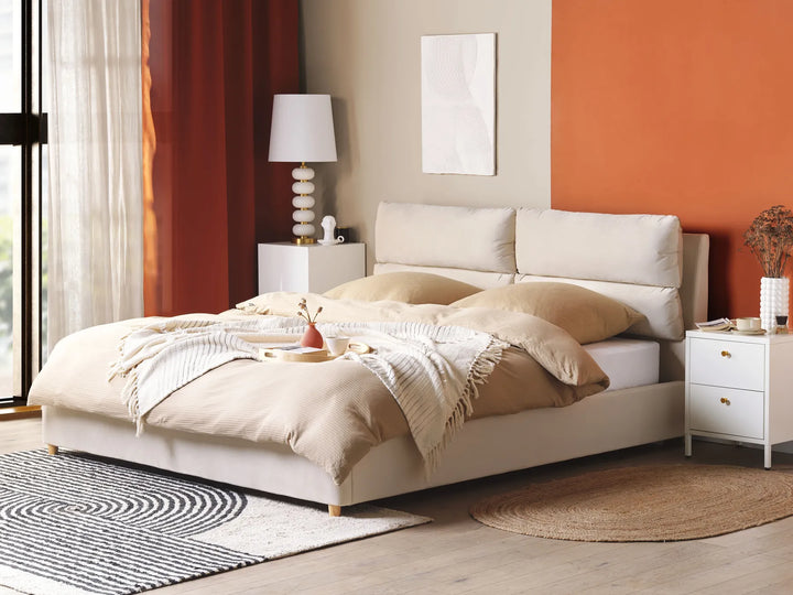 beige upholstered ottoman bed with spacious under‑bed storage