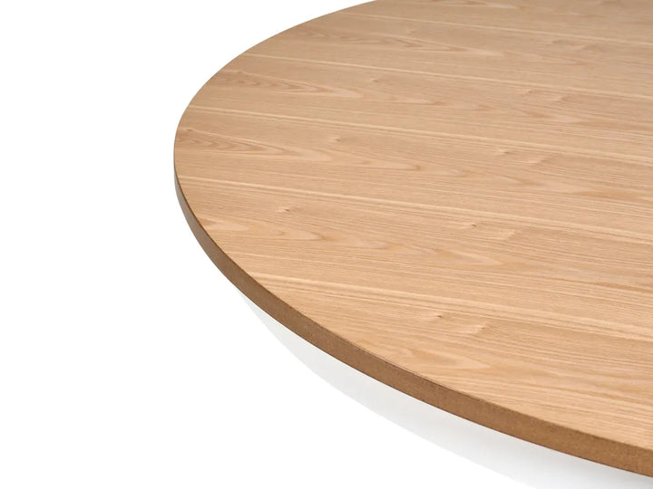 Round wooden table top on a white background