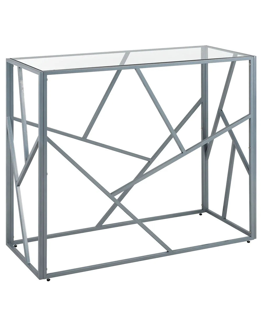 Modern console table with geometric metal frame and glass top on a white background