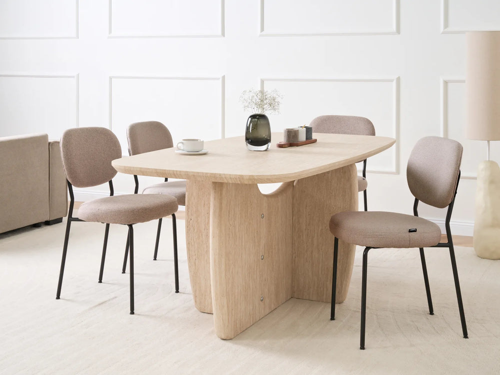 Dining table with chairs in a minimalistic room