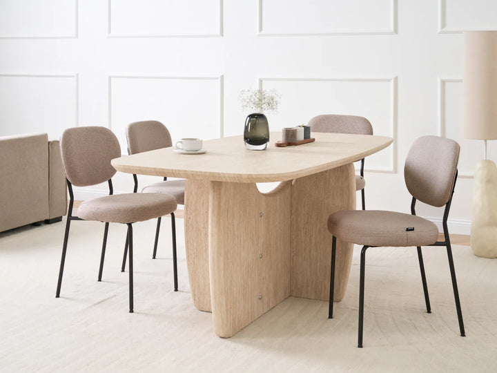 Dining table with chairs in a minimalistic room