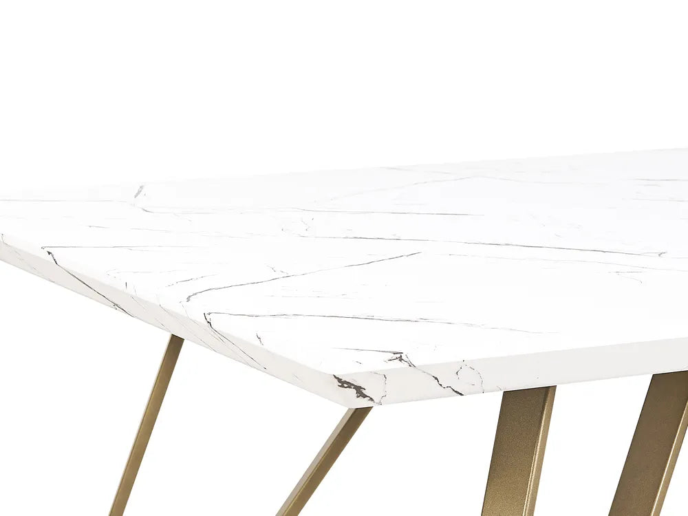 Round marble table with gold legs on a white background
