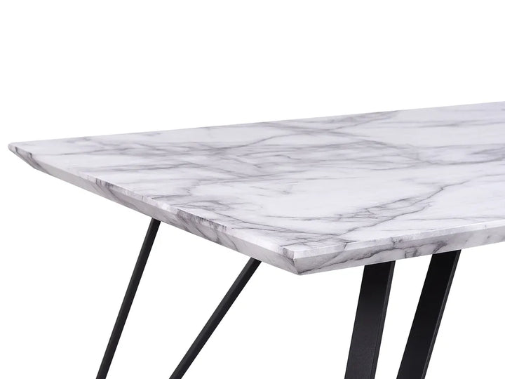 Marble-patterned table with black legs on a white background