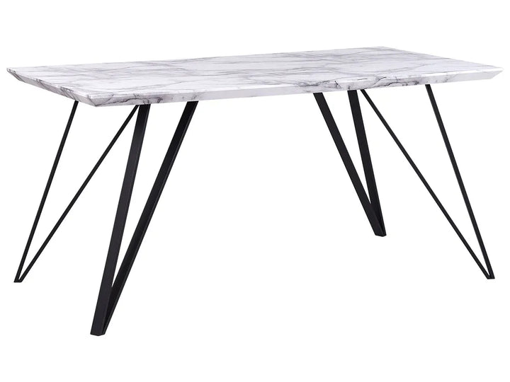 Dining table with marble-like top and black metal legs on a white background