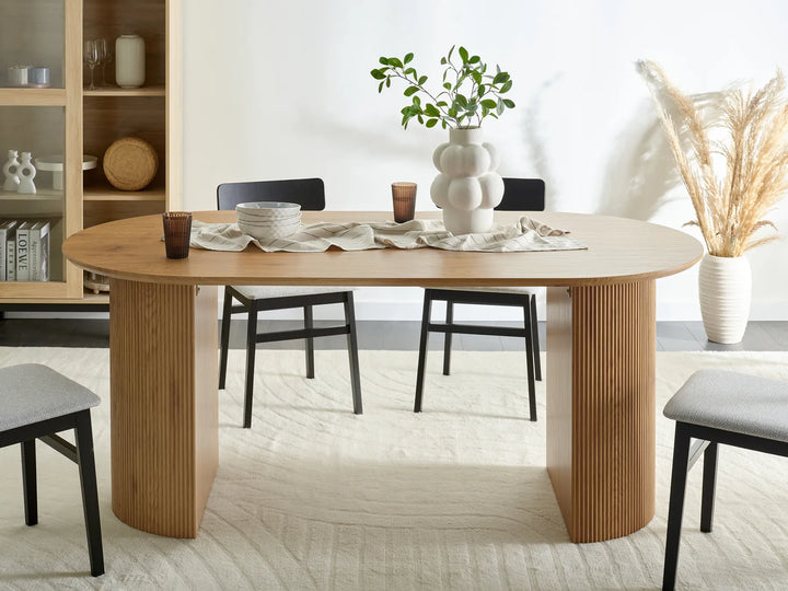 Dining table set with chairs in a modern kitchen