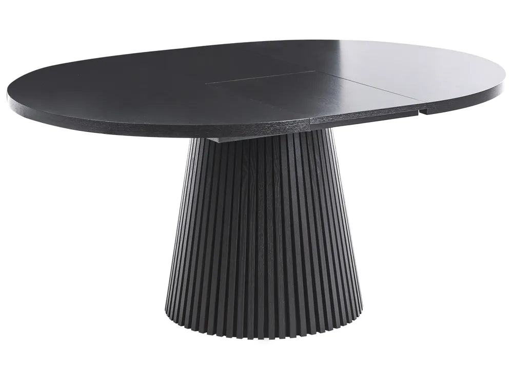 Black round table with a ribbed cylindrical base on a white background