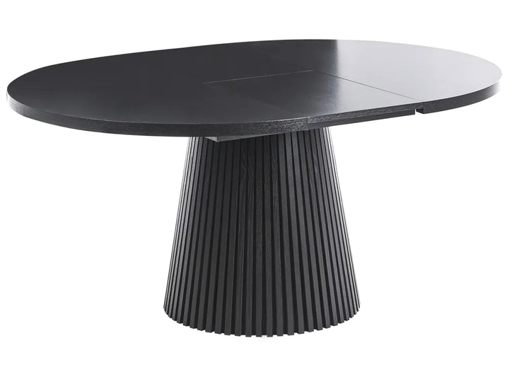 Black round table with a ribbed cylindrical base on a white background