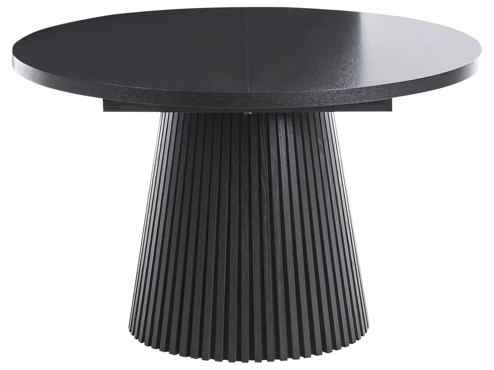 Black round table with a ribbed cylindrical base on a white background