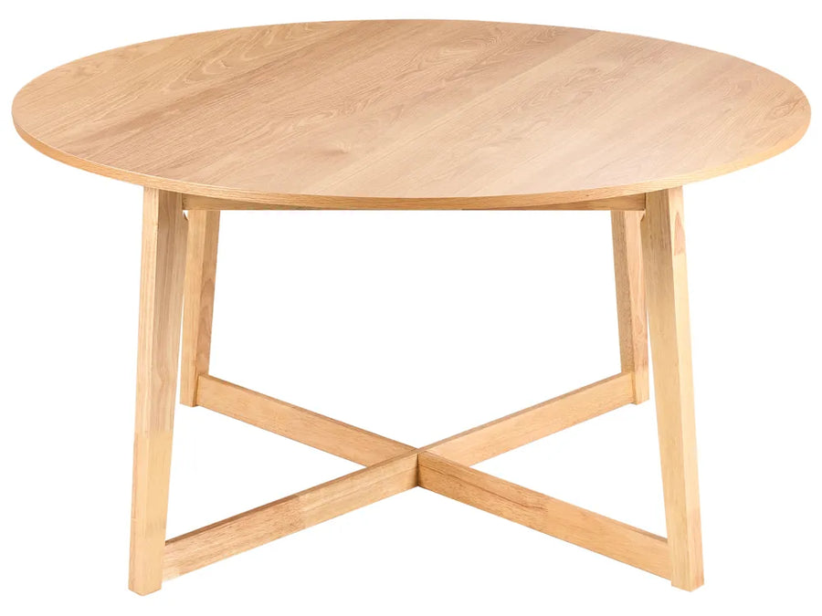Round wooden table with a light finish on a white background